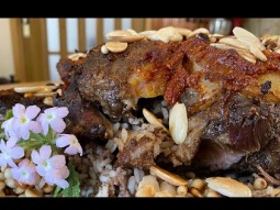 Braised lamb neck stuffed with meat and rice  رقبة خروف محشيّة
