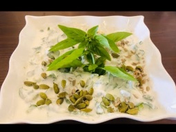 Yogurt salad with green leaves