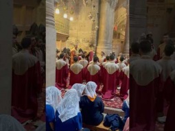 Prayer at Holy  Sepulcher church in Jerusalem