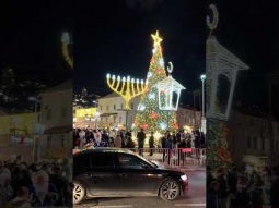 Christmas tree, Jewish Menorah and Muslim Crescent in Haifa