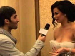 الممثلة العراقية جوانا كريم مع الإعلامي بشير شقير